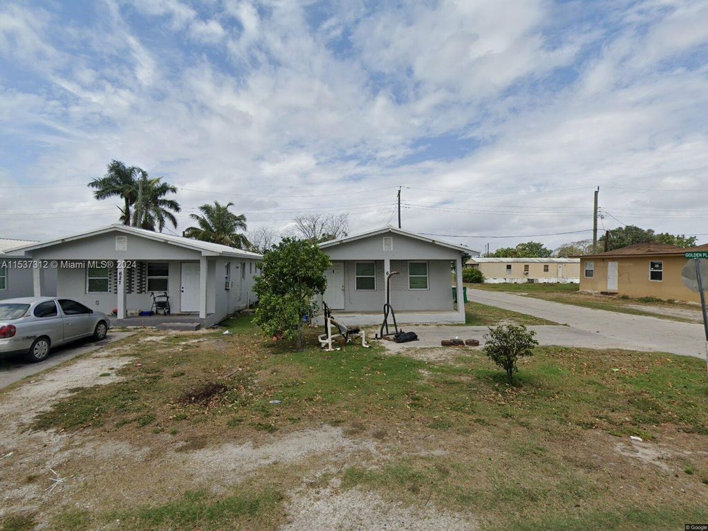 Photo of 601 Amaryllis Ave, Pahokee, FL 33476 (MLS # A11537312)