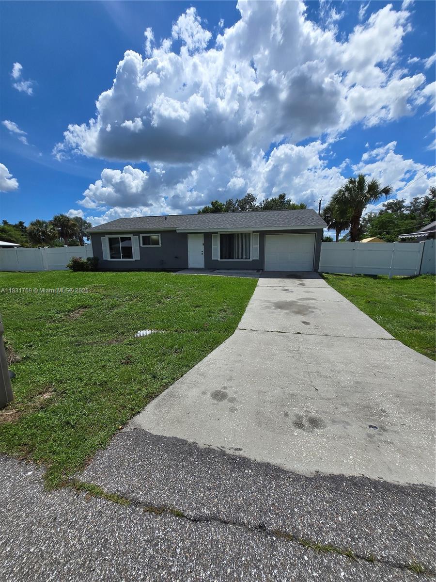 virtually Stage) Charming 2BR/1.5BA home with a room that includes a closet—perfect as a 3rd bedroom, office, or entertainment space. Located in central Port Charlotte, this home features tile flooring throughout, a spacious living area, and a large fenced backyard with West-facing rear exposure. New roof (2021), updated plumbing, central A/C, and 1-car garage with laundry hookups.
Minutes from Publix, Aldi, Walmart, Port Charlotte Town Center, and more. Zoned for Meadow Park Elementary, Murdock Middle, and Port Charlotte High School—all nearby. Quick access to US-41, Midway Blvd, and Charlotte Harbor. With a shed and plenty of yard space. Great location, great —ready for your next move!