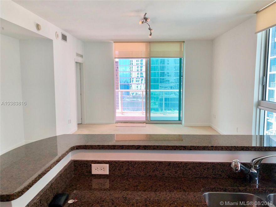 Best deal at Met 1!!! Drastically reduced for fast sale. Fabulous city views and partial water views from this 1/1.5 plan, carpet floors throughout, NW exposure. Italian cabinetry, granite countertops, stainless steel appliances, water, cable and Internet included. One assigned parking space on the 5th floor. Washer and dryer in unit. Walk to Whole Foods Market, Bayfront Park, Metro mover and just opened Novikov Restaurant downstairs, Joe & The Juice and 16-screen Silverspot Cinema at Met Square with more to come! Building offers luxurious life style, 24-hr front desk attended. Chic downtown living at its best!