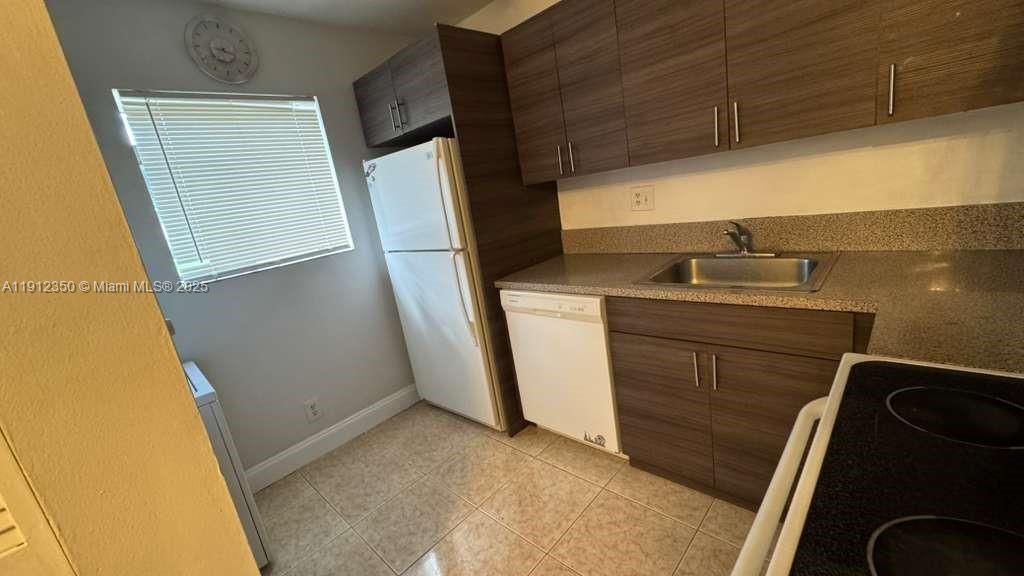 Photo of 306 Gardens Dr #103, Pompano Beach, FL 33069 (MLS # A11912350)