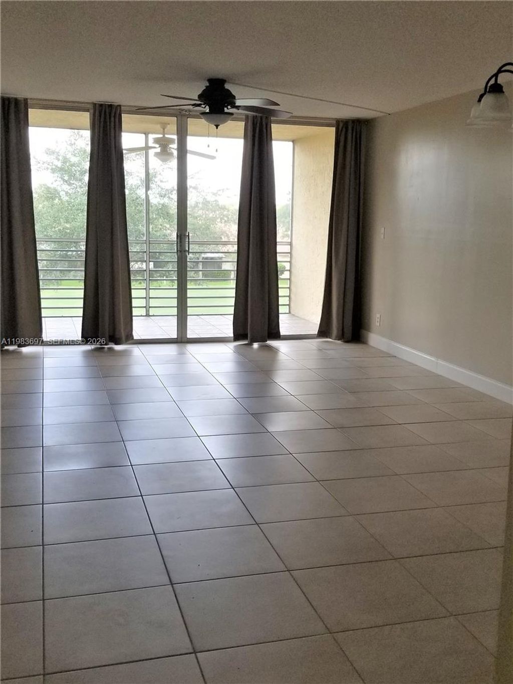 Photo of 9520 Seagrape Dr #303, Davie, FL 33324 (MLS # A11983697)