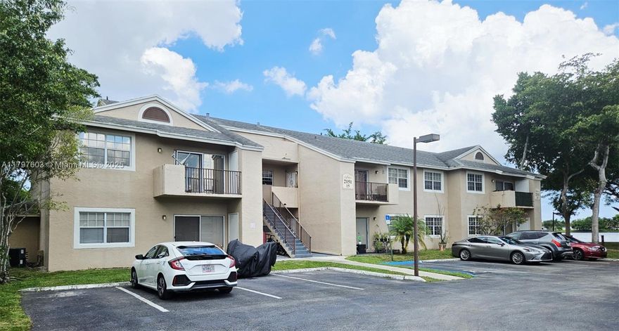 REDUCED PRICE FOR FAST SALE! BEAUTIFUL CONDO WITH BALCONY LOOKING TOWARDS A GORGEOUS WIDE LAKEVIEW! EXCELLENT "A" ELEMENTARY SCHOOL, TILED & WOOD FLOORING THROUGHOUT, WASHER & DRYER INSIDE UNIT, ACCORDIAN HURRICANE SHUTTERS, COMMUNITY WITH POOL, CLUBHOUSE, GYM, TENNIS COURTS, BASKETBALL COURT, AND MORE! BUILDING IS ONLY TWO FLOORS AND THIS CONDO IS ON 2ND FLOOR WITH NO NEIGHBORS ABOVE. CALL TODAY FOR MORE INFORMATION AND SHOWING INSTRUCTIONS