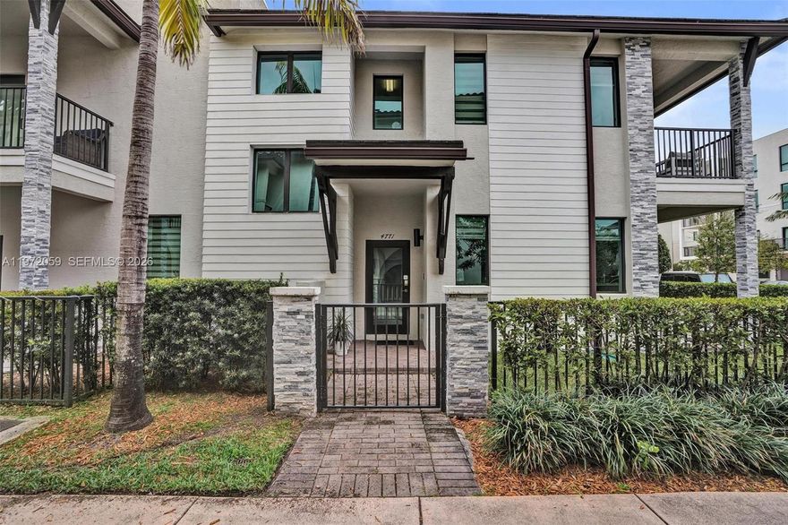 Welcome to this beautifully appointed 3-bedroom 3.5-bath premium corner townhome with a 2-car garage in the desirable Urbana at Downtown Doral. Built in 2019, this smart home features a Nest security system, impact windows and doors, and a bright open-concept layout. The first floor offers porcelain tile flooring, a modern kitchen with quartz countertops and stainless-steel appliances, dining area, designer lighting, a powder room, a family room that opens to a covered patio and a private fenced yard. The second floor features carpet throughout, a versatile loft, a primary bedroom with a large balcony, a bathroom with dual vanities and a spacious shower, two additional bedrooms each with its own en-suite bathroom, and a laundry room. Pet friendly community. Can lease right away. Enjoy great amenities, including clubhouse, pool, fitness center, and more. Prime location a couple of blocks from vibrant Downtown Doral shopping and dining; minutes from CityPlace Doral and top rated schools.  Close to highways, and Miami International Airport.