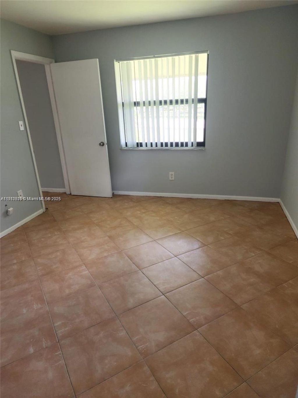 Photo of 6061 Shakerwood Cir #208, Tamarac, FL 33319 (MLS # A11912815)