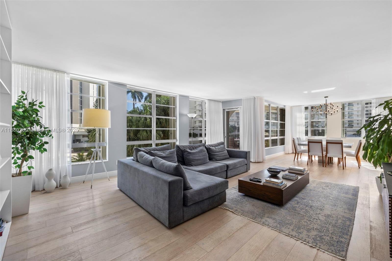 Step into this stunningly remodeled 2-bedroom, 2.5-bath residence boasting 2,210 square feet of modern elegance. The home showcases new flooring, designer kitchen, and spa-inspired bathrooms, all within an open-concept layout drenched in natural light. Residents enjoy a wealth of amenities, including a swimming pool, fitness center, sauna, billiard room, and library. FIFTY SIX-SIXTY COLLINS, a full-service building offers a private marina reserved exclusively for residents and has successfully completed its 40-year recertification, ensuring long-term security and value. With 24-hour security, valet service, doorman, and EV charging stations, this property blends modern upgrades with unmatched convenience. An absolute must-see for those seeking luxury and location in one package!
