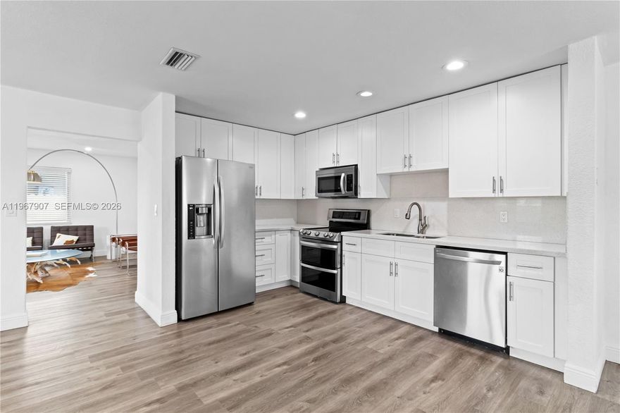 Excellent opportunity to own a fully renovated home in a prime location. This 3-bedroom, 2-bathroom property features many upgrades, including an updated kitchen with quartz countertops and stainless steel appliances, waterproof vinyl flooring, and remodeled bathrooms. Additional improvements include impact windows (2020) and a brand-new roof (June 2025). The home offers a well-designed, open layout with comfortable living spaces throughout. The backyard features a covered patio, ideal for relaxing or entertaining. Conveniently located just blocks from FIU and close to Florida’s Turnpike, restaurants, shopping, and other amenities. A great opportunity in a highly desirable area.