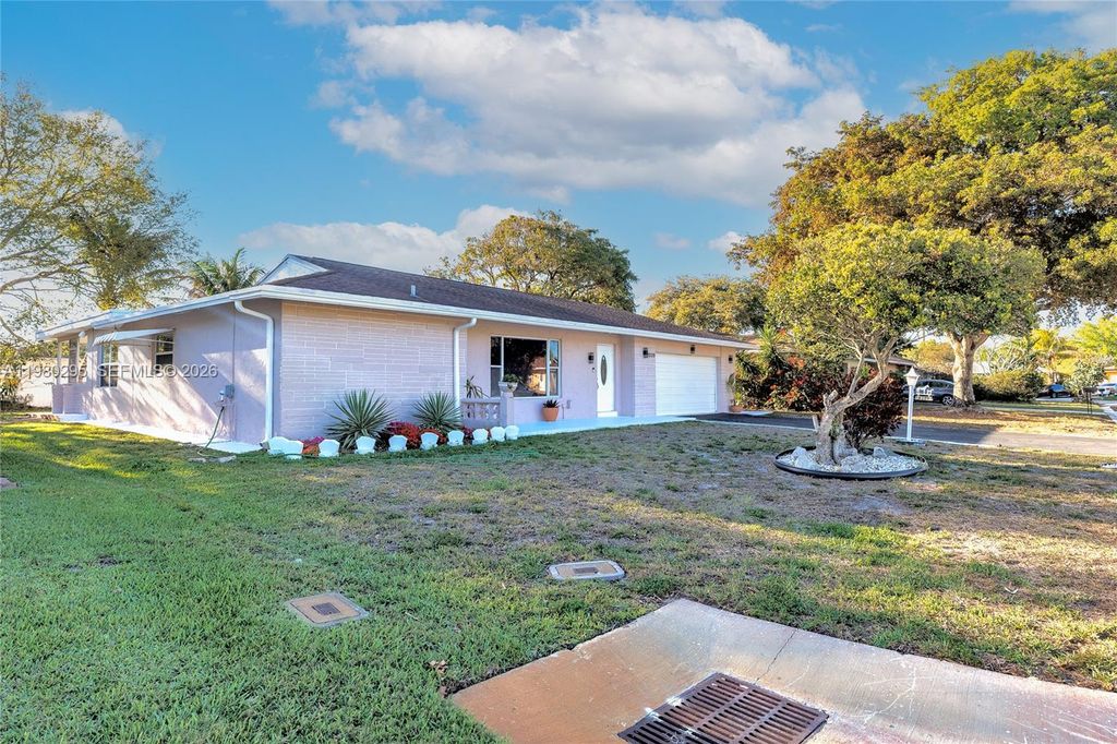 Photo of 8209 NW 91st Ave, Tamarac, FL 33321 (MLS # A11980295)