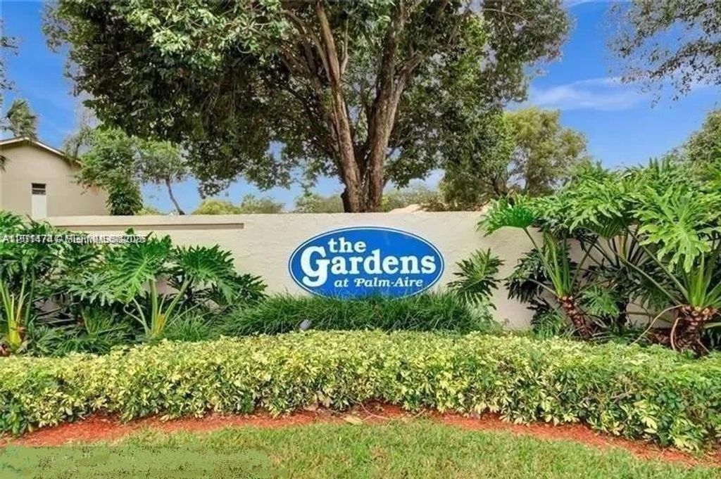 Photo of 715 Gardens Dr #103, Pompano Beach, FL 33069 (MLS # A12014747)