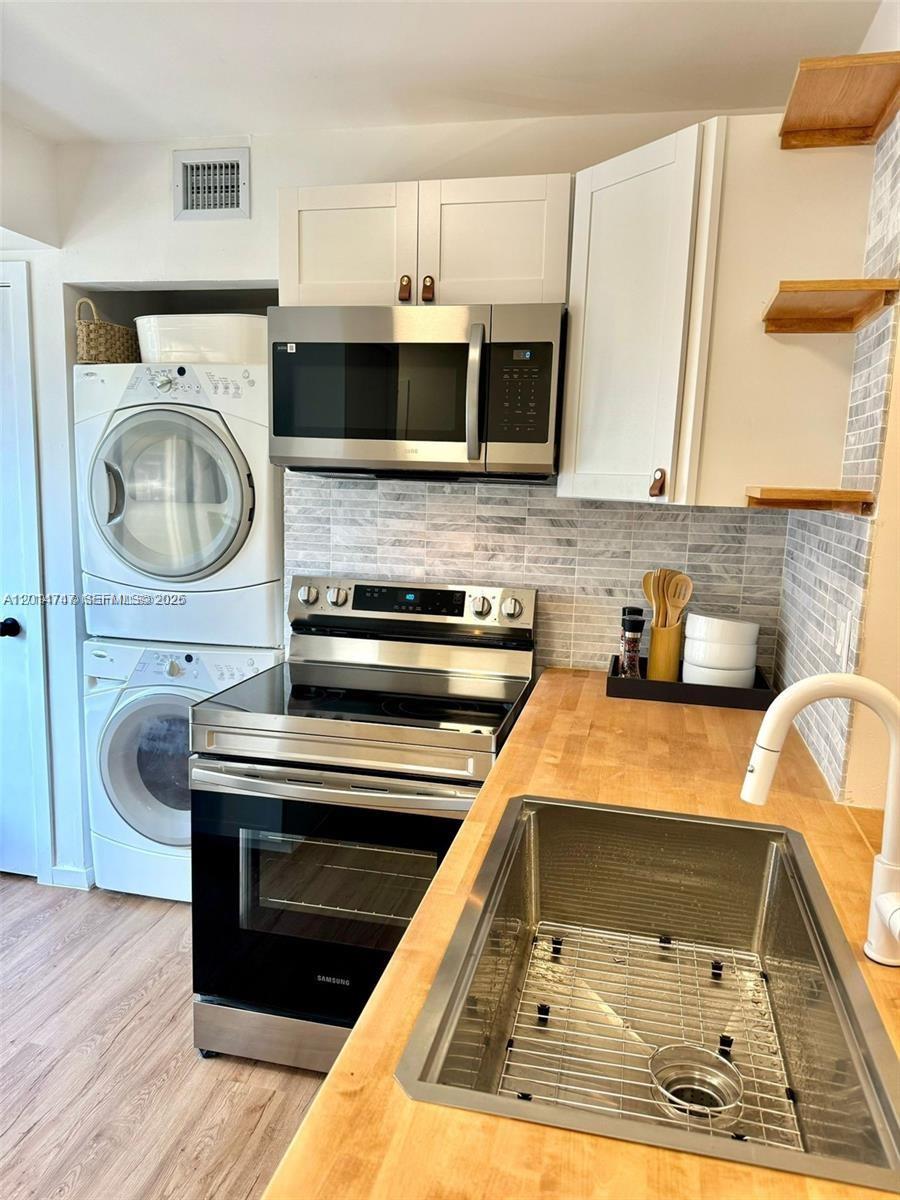 GARDENS NORTH ELEVEN COND - Residential Lease
