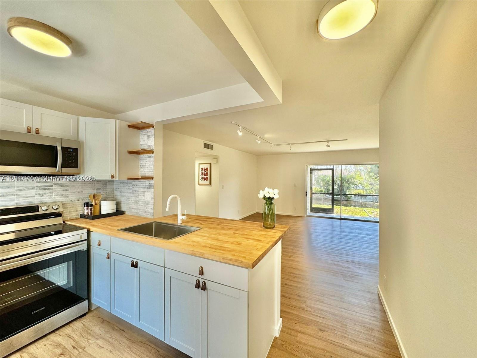 GARDENS NORTH ELEVEN COND - Residential Lease