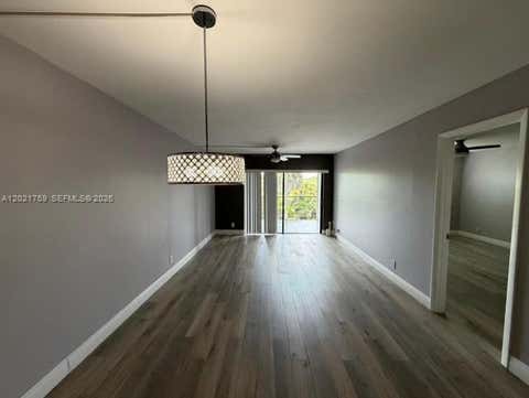 Photo of 9440 SW 8th St #320, Boca Raton, FL 33428 (MLS # A12021759)