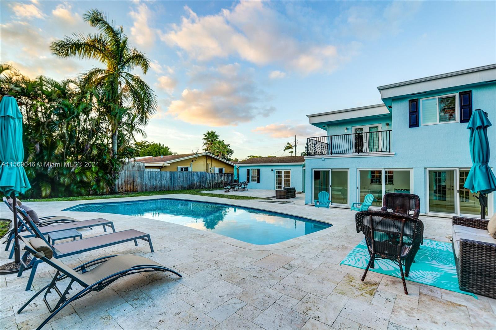Escape to your tropical sanctuary just moments to the beach. Nestled on an expansive double lot this home offers versatility for full time residency, hosting guests or investment opportunities. Discover a chef's dream in the open concept kitchen w/ new appliances. The spacious Florida Room invites relaxation with sliding doors opening to the pool/patio oasis & cabana bath. Upstairs, the owner's suite boasts a private deck, also a Jack/Jill bedroom w/ ample storage. A charming breezeway leads to the Guest House, offering comfort w/ a full kitchen, living/dining area & laundry. Enjoy resort-style living in a newly resurfaced heated pool. Impact windows/doors, a new roof 2021, newer AC, exterior paint 2022, interior paint 2023, lighting 2023. The freedom of no HOA, a true gem of coastal life.
