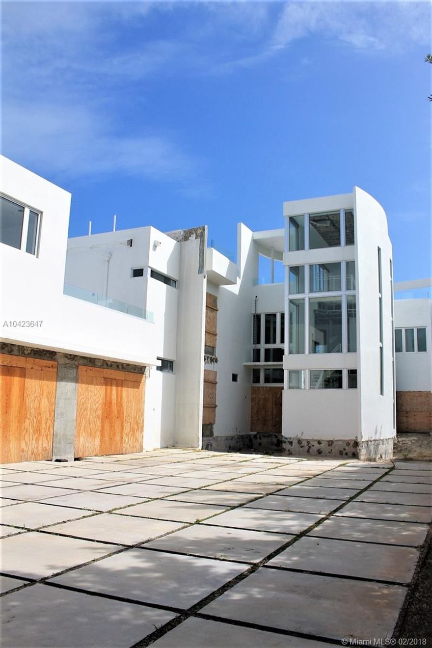 Amazing opportunity to buy this Pine Tree modern waterfront home at an undervalued price.
This home is a blank canvas and ready to be renovated. Over 7,000 sqft, 4 bedrooms, 4.5 Bathrooms plus a separated in-law quarters with kitchenette.  Approximately 15,000 sqft lot with 75 ft of open water coastal. 
This home comes with: Permit, plans, renderings, $150,000 worth of brand new kitchen cabinets and $70,000 worth of brand new bathrooms cabinets and sinks. 
Best value waterfront home on Miami Beach!