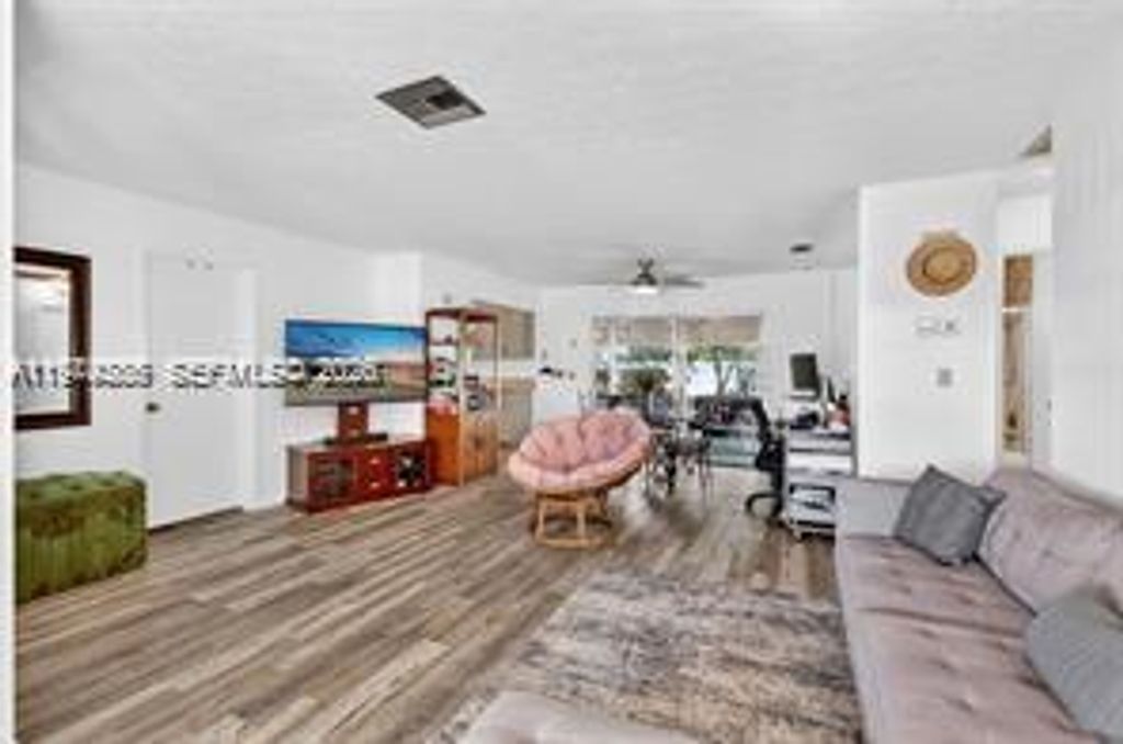 Photo of 1261 SE Mendavia Ave, Port St Lucie, FL 34952 (MLS # A11974285)