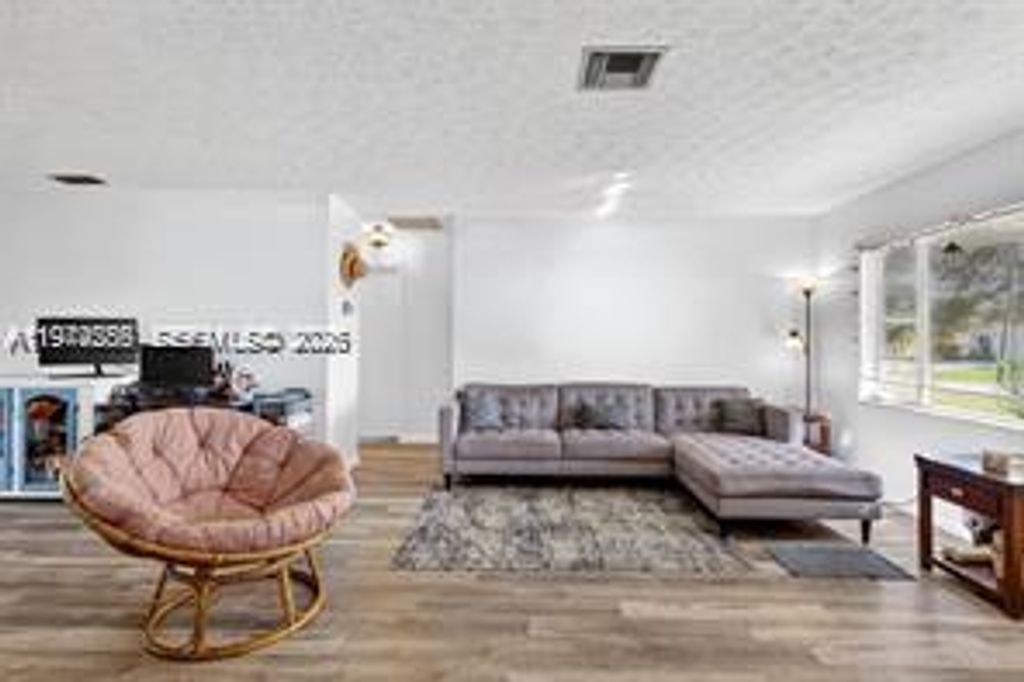 Photo of 1261 SE Mendavia Ave, Port St Lucie, FL 34952 (MLS # A11974285)