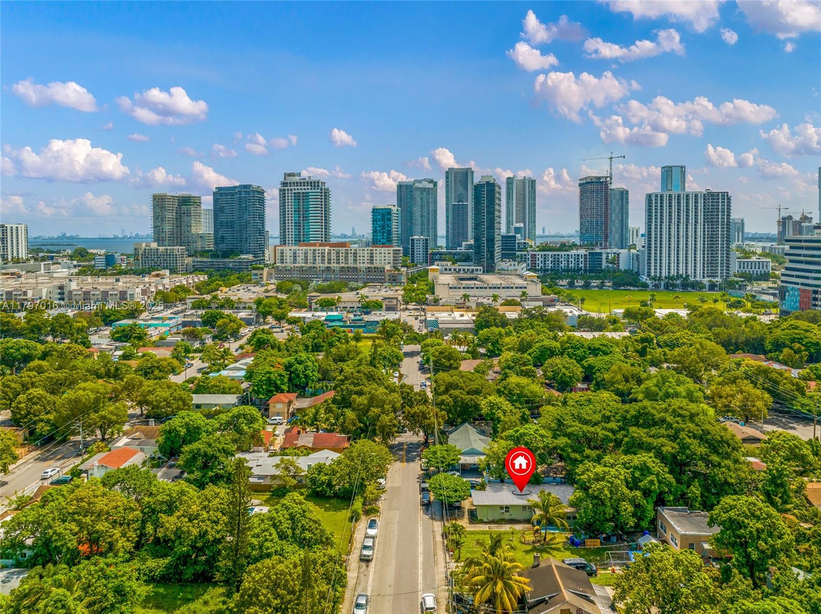 Investor and developer opportunity in the heart of Wynwood Norte. This multifamily duplex sits on a 7,200 sq ft lot zoned 3900 Multi-Family (T4-R), allowing up to 38–62 units per acre and offering strong redevelopment potential for up to approximately 15 units across four stories (subject to buyer verification). Currently configured as two 2-bedroom, 1-bath units, the property provides immediate rental income with long-term upside. Located just steps from Midtown Miami, the Design District, Wynwood Walls, and minutes from Downtown, Brickell, and major highways, this site is ideal for short-term rentals, future multifamily development, or boutique residential projects. All information must be independently verified by the buyer as part of their due diligence.