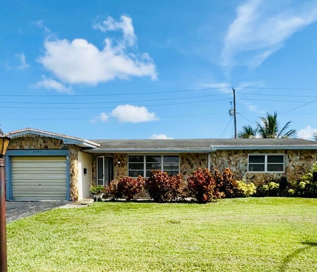 Welcome to your charming single-family home in the desirable Boulevard Heights neighborhood of Pembroke Pines. This cozy residence boasts 2 bedrooms, 1 bathroom, and a 1-car garage. The kitchen features elegant Corian counters, complemented by a mix of carpet and tile flooring. Step outside to a covered patio perfect for relaxing or entertaining. Ideal for first-time buyers or anyone who are looking to downsize. This home is conveniently located near schools, shopping, dining, and major highways. Don't miss your chance to make this lovely property your own and create lasting memories.