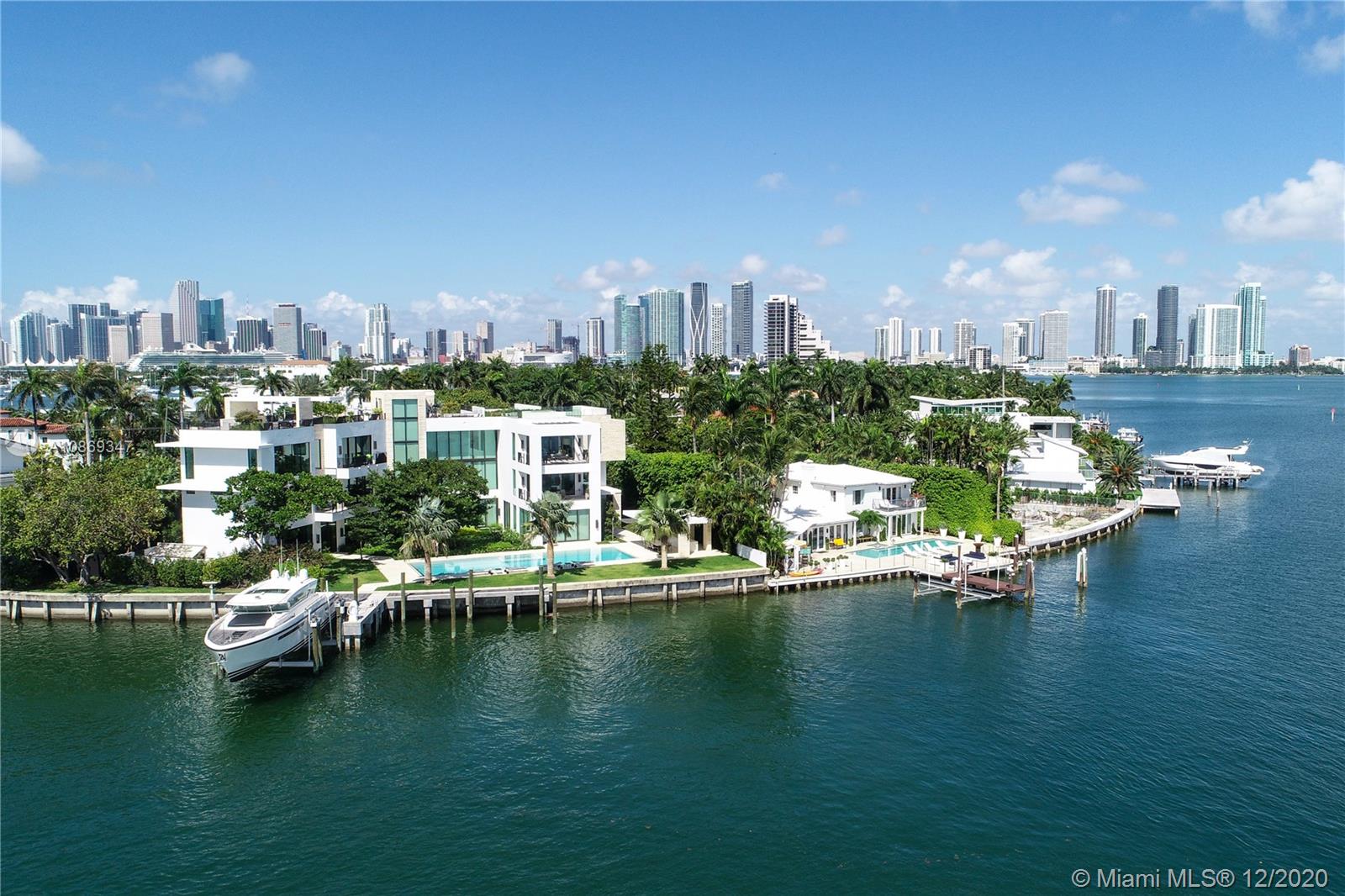 Completed in 2020. Positioned on a 26,500 sf lot spanning 208 ft of waterfront. 22,034 sf total area – total 15,560 sf under air with 6,474 sf of balconies and terraces. Spectacular roof top terrace with spa and wet bar offering 360-degree views of the bay and city skyline. Dufner Heighes provided both exterior and interior design integrating NY and Miami sensibilities. Dufner Heighes has successfully designed numerous projects throughout the Country and thoughtfully created a unique home on the Venetian Islands. Modern and understated furnishings surround unique features which create a panoramic, serene and exciting place to enjoy life.