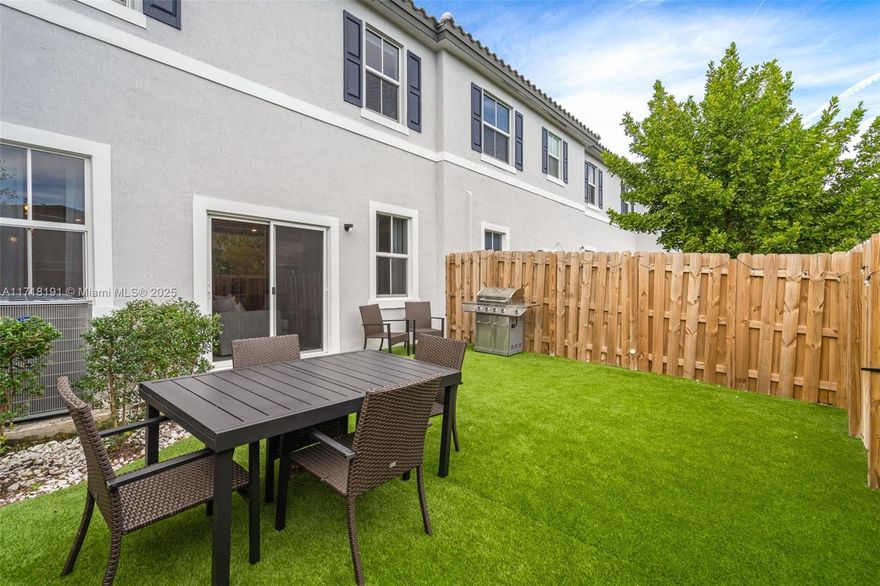 Modern 2-story townhome built in 2023. 1st floor features an open-space kitchen, living and dining, half-bath, a 1 car garage and a 450 sf fenced backyard with artificial grass. The second-floor has 3 bedrooms, 2 baths and a laundry with stacked washer & dryer. Ring smart-home features, impact windows, fridge, microwave, electric range, dishwasher, disposal, washer, dryer and an FPL electric vehicle charger. Sunset Trails is a gated community that offers a pool pavilion for you and your family to relax poolside, a children’s playground that will be your kids favorite place to make new friends, and a beautiful 2-mile walking path for a healthier lifestyle just outside your front door. A+ Schools, tons of retail & restaurants nearby, plus easy access to highways and parks!