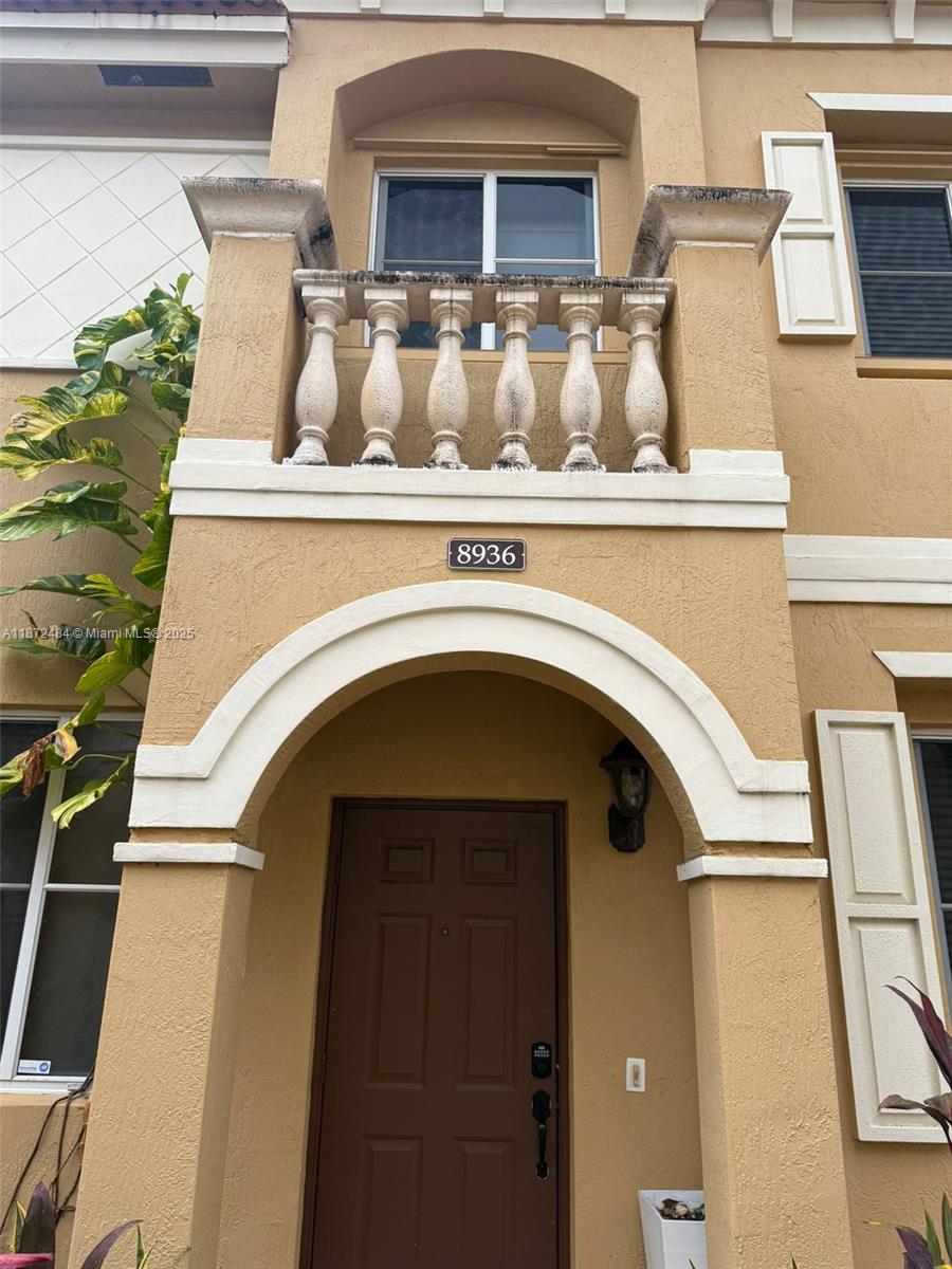 Discover this beautiful townhouse in the desirable Village Walk of Miramar. The home offers a bright, open layout with a contemporary kitchen equipped with granite counters and stainless steel appliances. Additional storage is conveniently located beneath the staircase. Upstairs, you’ll find both bedrooms, including a primary suite with a spacious walk-in closet and sleek laminate flooring throughout.
Village Walk is a gated community featuring a swimming pool, playground, and recreational areas for residents to enjoy. Two assigned parking spaces are included. Ideally situated in a central location, this property is just minutes from shopping, dining, and more.
