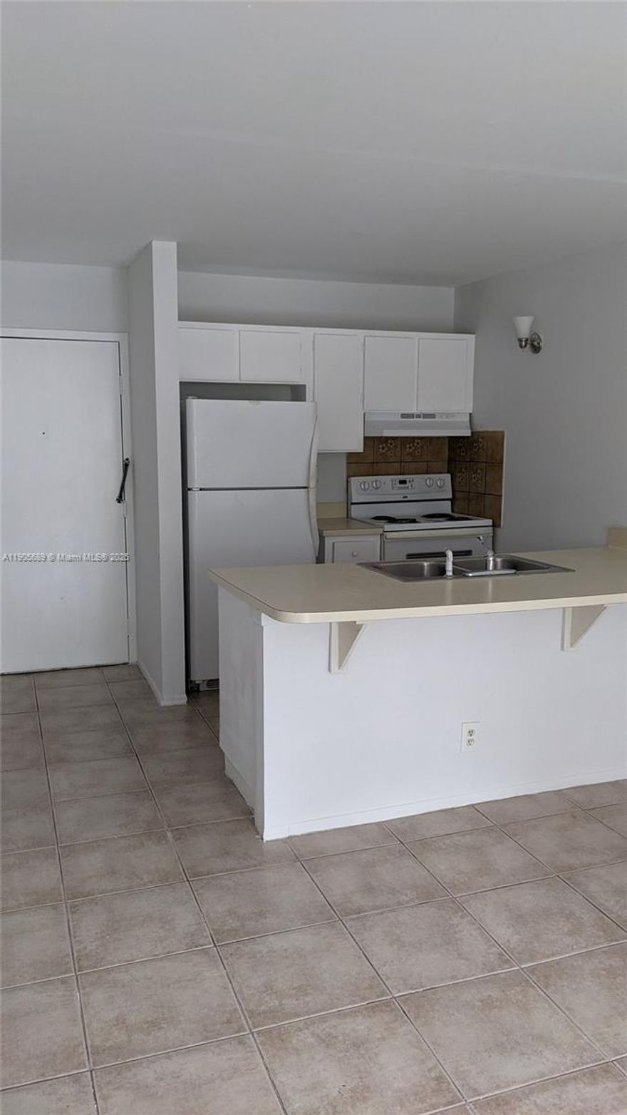 Spacious 1-Bedroom, 1-Bathroom Apartment located on the secure 2nd floor of a building in the vibrant heart of Coral Springs. Accessible via elevator or stairs, this unit features tile flooring in the kitchen and living room, while the bedroom offers cozy carpeting. Enjoy the convenience of a large walk-in closet and an inviting open balcony. Centrally positioned, this residence is in close proximity to places of worship, public transportation, and the popular Coral Square Mall. Move-in ready and waiting for you! The building boasts enhanced security with an electronic fob system, ensuring peace of mind for residents.