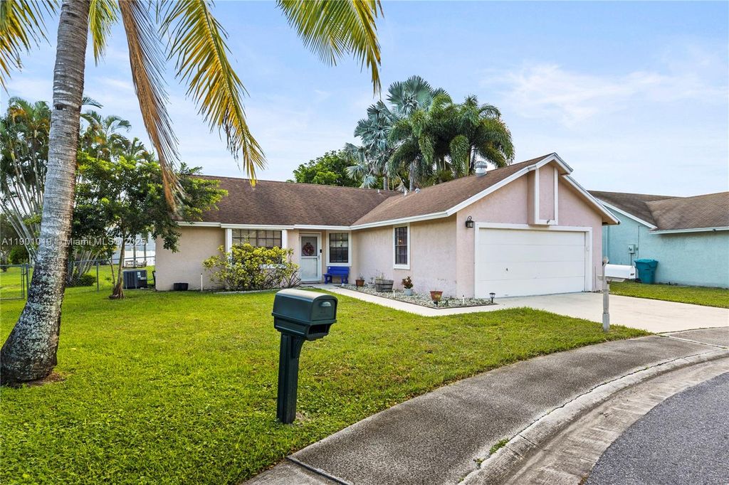 Photo of 1827 N Banyan Creek Cir N, Boynton Beach, FL 33436 (MLS # A11901019)