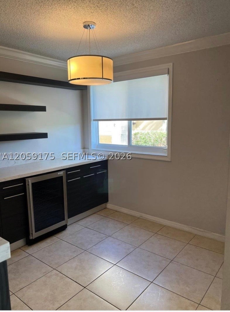 Photo of 2600 S University Dr #114, Davie, FL 33328 (MLS # A12059175)