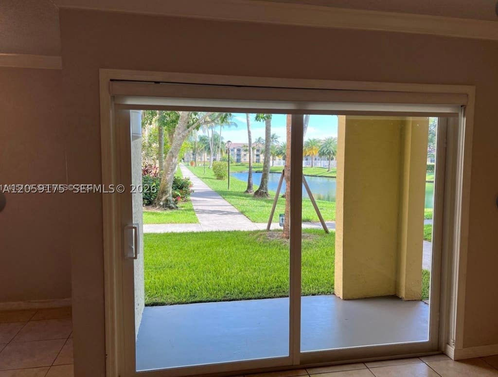 Photo of 2600 S University Dr #114, Davie, FL 33328 (MLS # A12059175)
