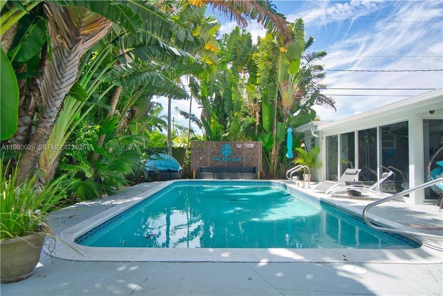 Beautiful updated pool home located in the desirable Poinsetta Park area of Hollywood, this charming residence offers 2 spacious bedrooms plus a versatile Florida room that can easily be used as a 3rd bedroom, office or gym. The home features an updated kitchen and bathrooms, terrazzo, original wood flooring, and large sliding glass doors that bring in natural light and open to a private tropical backyard with an in-ground pool, perfect for entertaining or relaxing.
Prime location just minutes from Hollywood Beach, Young Circle, shopping, and restaurants.