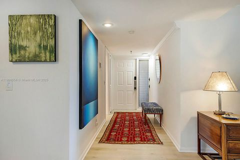 Photo of 5390 Woodland Lakes Dr #301, Palm Beach Gardens, FL 33418 (MLS # A11908558)