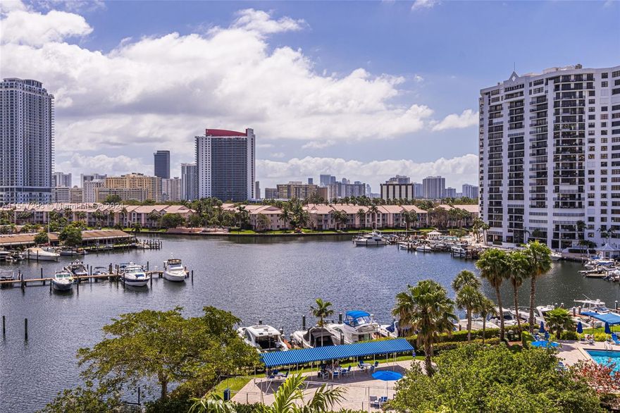 SPECTACULAR WATER VIEWS FROM EVERY ROOM. THIS FULLY RENOVATED CONTEMPORARY 2 BEDROOM CORNER WRAP IS FROM THE PAGES OF ARCHITECTURAL DIGEST! SMOOTH CEILINGS & PORCELAIN FLOORING THROUGHOUT. GOURMET OPEN CONCEPT KITCHEN OFFEERS TOP OF THE LINE STAINLESS APPLIANCES, CENTER ISLAND WITH COOKTOP & RANGE HOOD, GLASS BACKSPLASH, LED LIGHTING & QUARTZ COUNTERS! SPACIOUS LIVING ROOM HAS BUILT-IN FLOATING CABINETS & LIGHTED SOFFITS AS ADDED DESIGN. PRIMARY & GUEST BEDROOMS HAVE ELECTRIC SOLAR SHADES & "CUSTOM DESIGNED WALK IN CLOSETS". BOTH BATHROOMS HAVE MODERN ZEN FEATURES INCLUDING KOHLER FIXTURES, SEAMLESS GLASS SHOWER, SOPHISTICATED TILES WITH PEBBLE SHOWER FLOORING. HVAC INSTALLED IN 2020. OLYMPUS OFFERS RESORT STYLE LIVING MINUTES TO BEACHES. STATE OF THE ARE MULTI MILLION DOLLAR CLUB HOUSE.