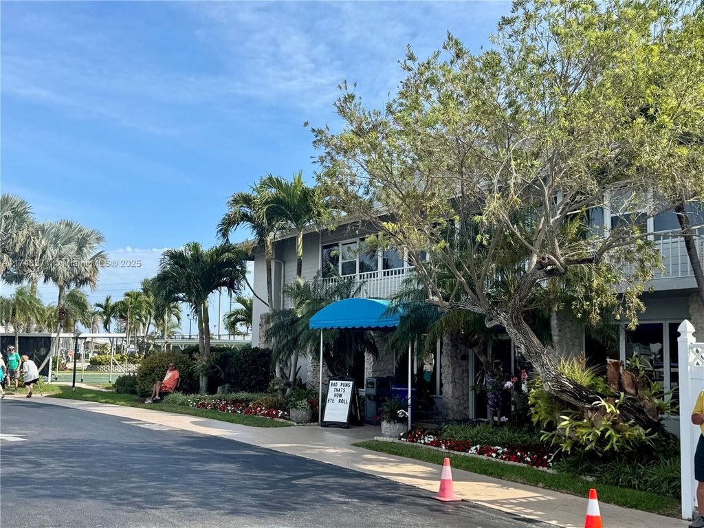 Photo of 1007 Nettles Blvd, Jensen Beach, FL 34957 (MLS # A11748371)