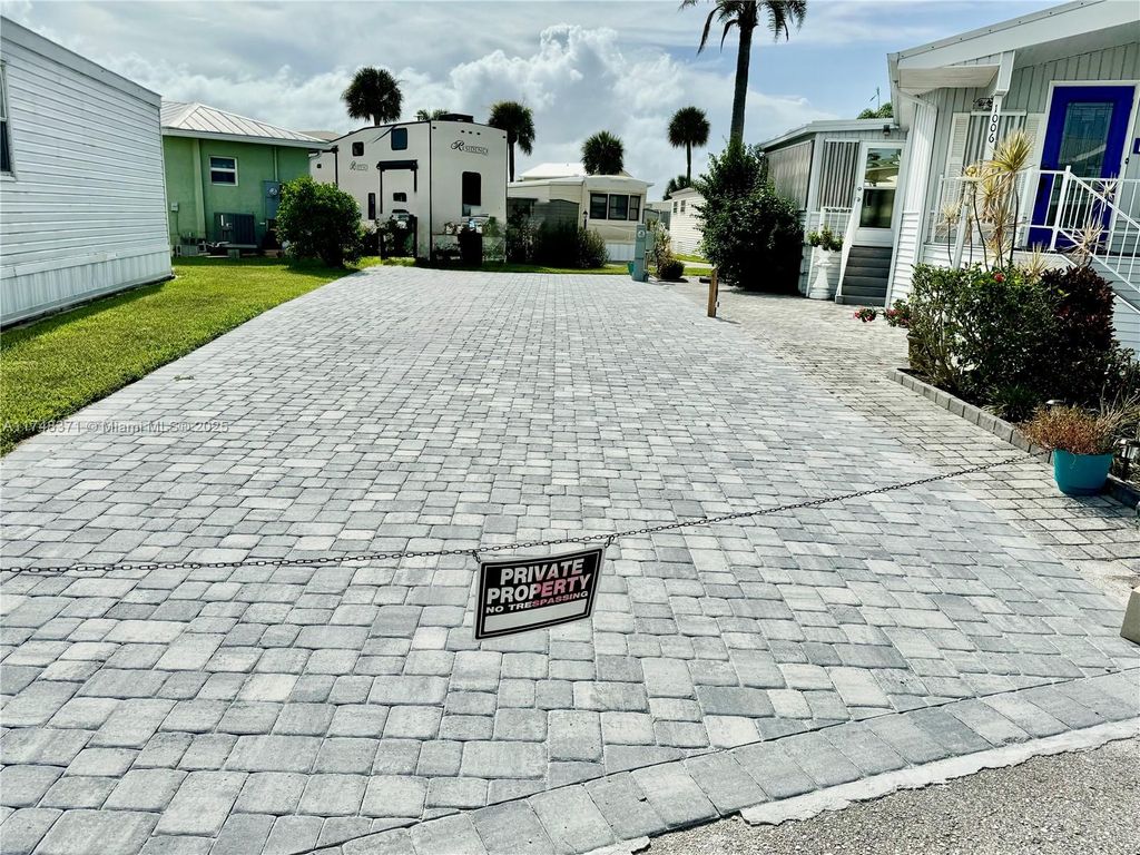 Photo of 1007 Nettles Blvd, Jensen Beach, FL 34957 (MLS # A11748371)