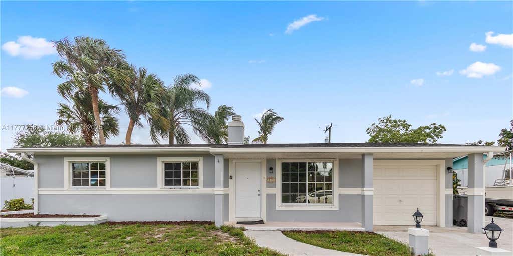 Photo of 813 Sarazen Dr, West Palm Beach, FL 33413 (MLS # A11777258)