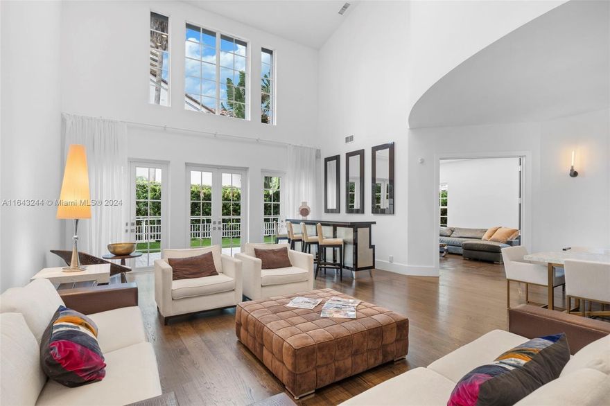 Elevate your living experience in this recently renovated Turnberry Estates residence. Featuring 3 bedrooms, a den, 3.5 bathrooms, boasting 30-foot-high ceilings across its expansive 3,351 sq.ft. of living space. Every detail has been meticulously curated, from impact windows, brand-new roof, smart toilets and whole-house water filtration system. Equipped with Italian craftsmanship throughout with an armored main door, sleek interior doors, and Veneta Cucina kitchen equipped with top-of-the-line fixtures. Take advantage of the close proximity to the Turnberry Marina, Turnberry Isle Country Club, and Aventura Mall. Situated within an exclusive gated community of just 25 homes, with 24-hour security, this residence offers unparalleled privacy and exclusivity.