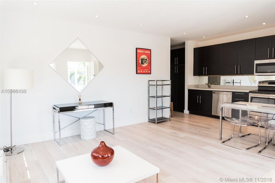 Cozy and modern South Beach condo, top floor corner unit with a lot of window light and a lot of closet space. Modern upgraded kitchen stainless steel appliances, quartz- counters top, and dishwasher. This unit is completely furnished and features washer & dryer within the unit ready to move in. Walking distance to the beach, Flamingo Park, Restaurants, public transportation and more.