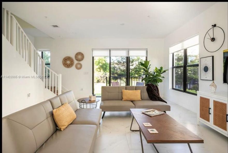 Stunning corner modern townhouse has everything you're looking for!. 
Spacious flow-thought layout with 10' ft ceilings, ceramic flooring and natural light throughout. On the first floor you'll find stainless steel appliances, kitchen island, modern cabinetry, half bath and modern decor. On the second floor a 3 bedroom split layout welcomes you, along a full equipment laundry, tittle flooring, LED bathroom mirrors, balcony, lagoon views and lots of space. This previous townhouse is located minutes from the Guitar Hard Rock Hotel, national parks, grocery stories, Aventura mall and 20 minutes from the beach. This home wont last!
