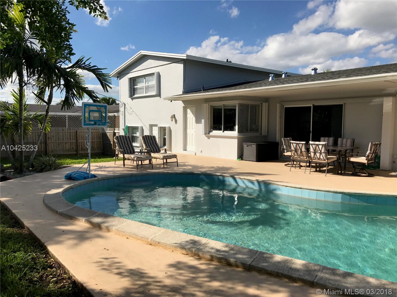 Beautiful house with pool! 4 bedrooms and 2.5 bathrooms plus Den. Completely updated with tile floors in common areas, wood floors in bedrooms, granite counters and stainless steel appliances in kitchen, and great bathrooms. Great pool view from kitchen and living. Full of natural light. Large bedrooms and lots of space. Almost a 1/4 acre lot. Great location in the quiet friendly neighborhood of Palmetto Estates. Part of a golf course community Quiet street! Close to Publix and stores. MUST SEE!! 2 year lease. The rent price includes lawn and pool maintenance and ADT security alarm services.