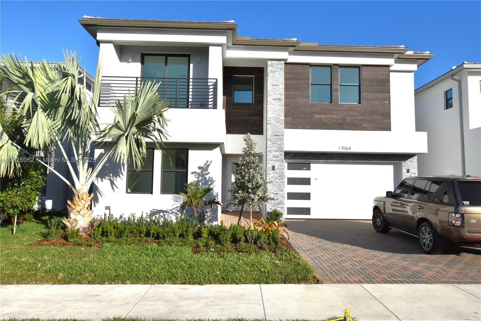Pool, Lake view and Brand new Modern 5 Bedroom 7 bath Polynesia Model with pool. Wood flooring in master bedroom. Master features two bathrooms and two closets and a linen closet. All other Bedrooms are ensuite and there is an additional cabana bath on the first floor. Walking distance to Clubhouse with every Resort Style imaginable Amenity. Heated pool, business center, Gym, Restaurant, Pickle ball and tennis courts, indoor basketball and more.
