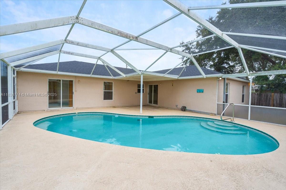 This spacious 4-bed, 2-bath rental has been fully updated—new floors, fresh paint, new roof, and stylish kitchen and baths. Enjoy Florida living in the huge screened-in pool area, perfect for relaxing or entertaining. Includes a 2-car garage and move-in-ready charm!