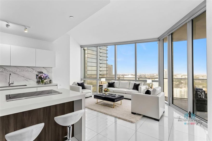 Welcome to Residence 3010 at Paramount Miami Worldcenter! This unique 1-bedroom + den, 2-bath condo features a private foyer, with the elevator opening directly into the residence for ultimate privacy. The spacious, well-designed layout includes a versatile den that can easily be converted into a second bedroom or a private office. The primary suite offers a luxurious bathroom with a soaking tub, separate shower, and dual sinks. Enjoy seamless indoor-outdoor living with a 200 SQFT balcony, perfect for an outdoor lounge. The residence is finished with modern details and Bosch appliances. Two parking spaces are included—one assigned and one valet. Residents enjoy world-class amenities including a soccer field, tennis and basketball courts, resort-style pools, spa, and more—all in the heart of Downtown Miami.