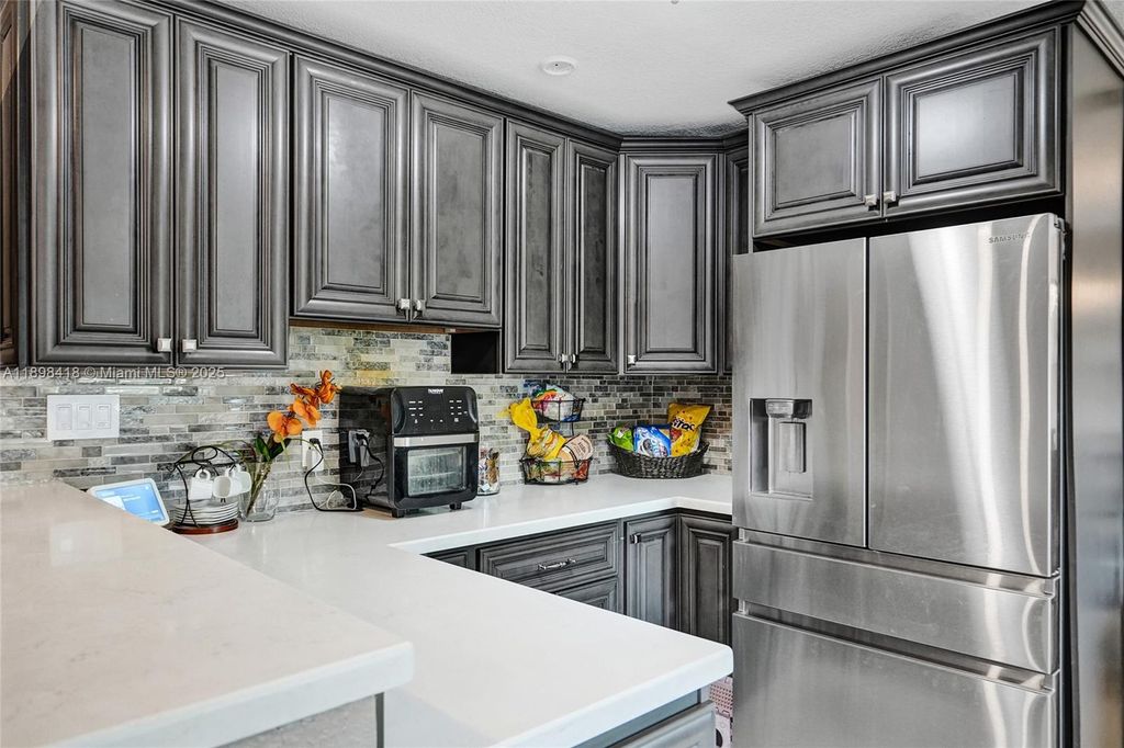 Photo of 9440 SW 49th Pl, Cooper City, FL 33328 (MLS # A11898418)