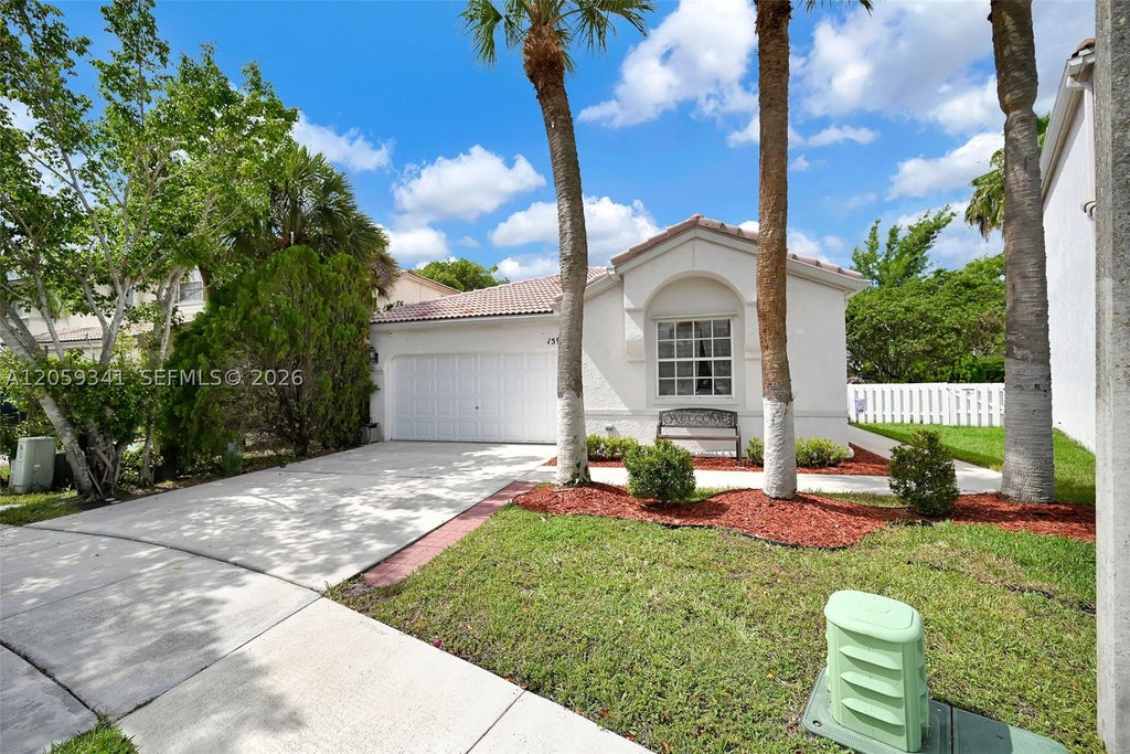 Photo of 15982 NW 12th Ct, Pembroke Pines, FL 33028 (MLS # A12059341)