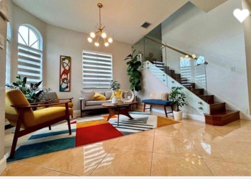 Beautiful modern 2 story 5 bedroom 3 bath home in very quiet area of area. Spacious and open living areas, and bedrooms, tile floors, great open kitchen with stainless steel appliances, laundry room upstair, double garage. Fenced backyard with awning and room for pool. No association fees Close to main expressways, shopping and restaurants