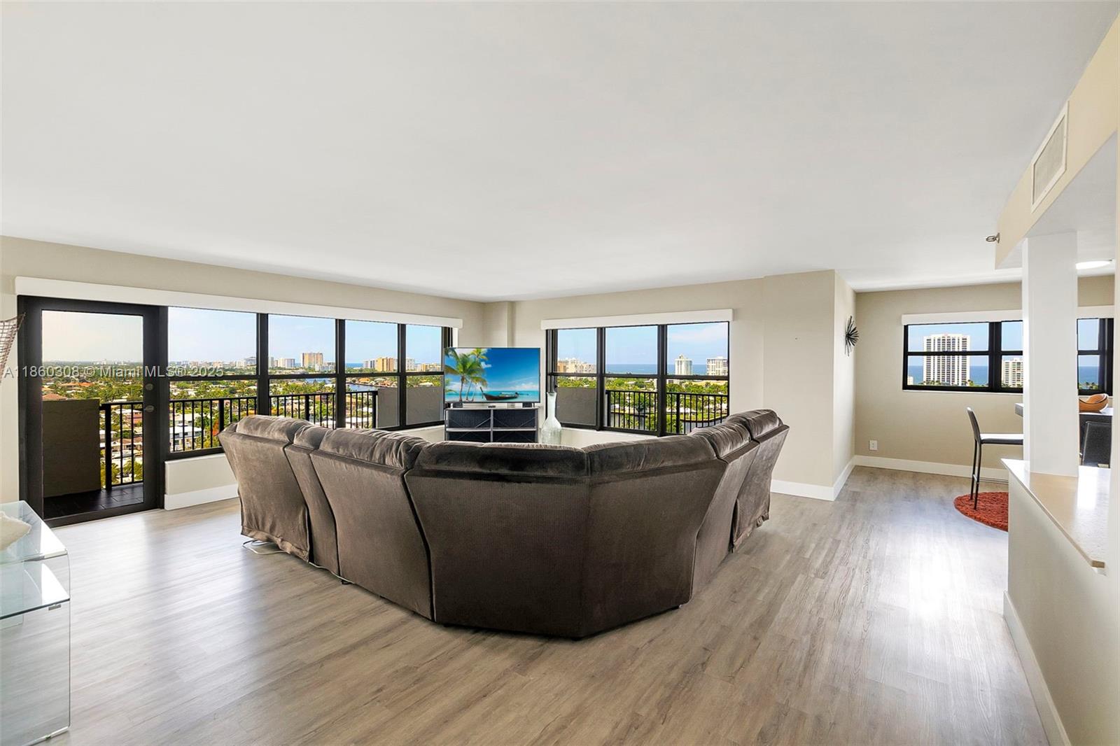 RENOVATED EAST-FACING, HIGH-FLOOR, CORNER UNIT WITH MILLION-DOLLAR OCEAN, INTRACOASTAL, MARINA VIEWS, and a wrap-around balcony. Primary and guest bedrooms have large closets and renovated bathrooms. The open kitchen has lots of cabinetry and amazing views. Separate dining is off a large living space with ocean and marina views. The wraparound balcony is envied by ALL. Most recent comparable sold for much more. Fort Lauderdale's best gated community. CABLE/WIFI included. WASHER & DRYER IN UNIT. 24-hour guards. Close to all restaurants, shops,, and the best beaches. No smoking building! No resident-owned pickup trucks or motorcycles. Move right in or rent out immediately. 40-YEAR-INSPECTION CERTIFIED. RESERVES FUNDED. EV chargers. Building is so well financed, you can put 5% down!