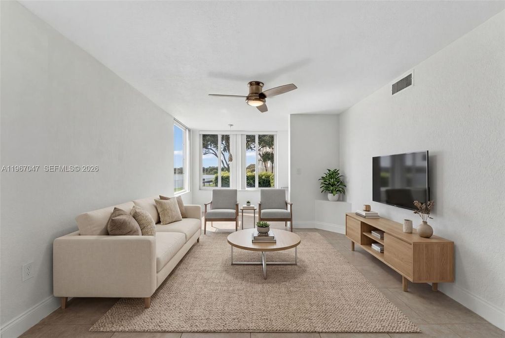 Photo of 2841 N Oakland Forest Dr #110, Oakland Park, FL 33309 (MLS # A11967047)