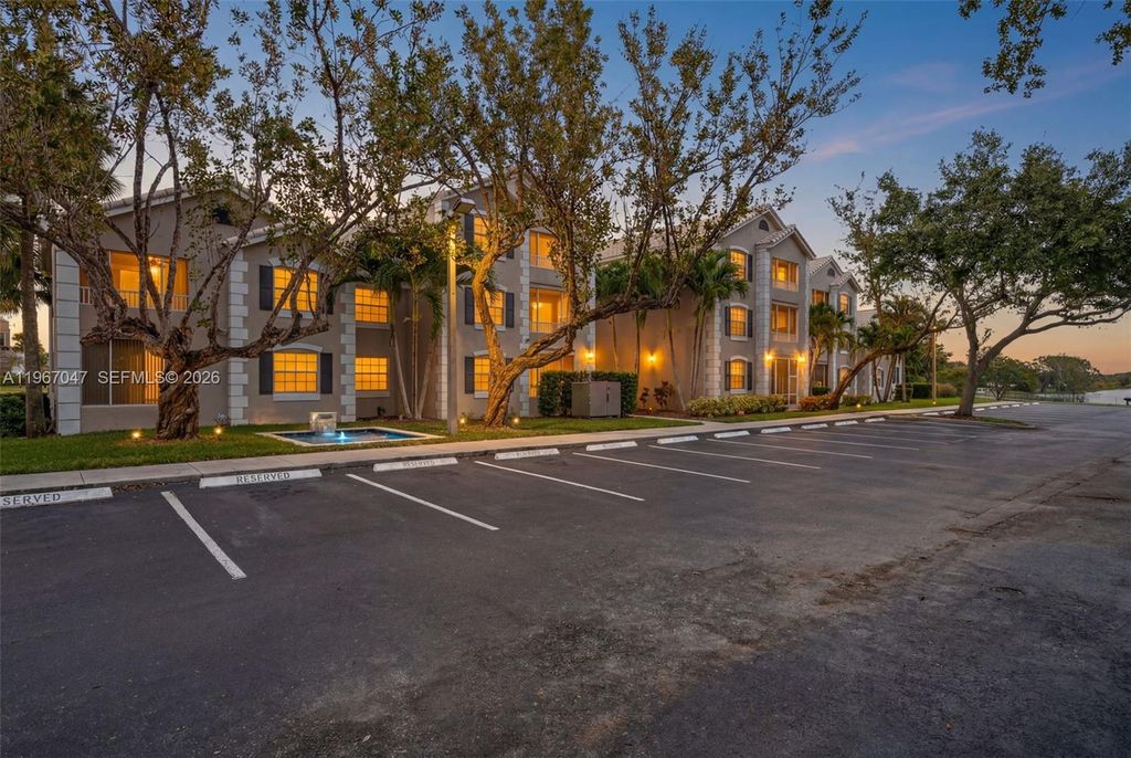 Photo of 2841 N Oakland Forest Dr #110, Oakland Park, FL 33309 (MLS # A11967047)