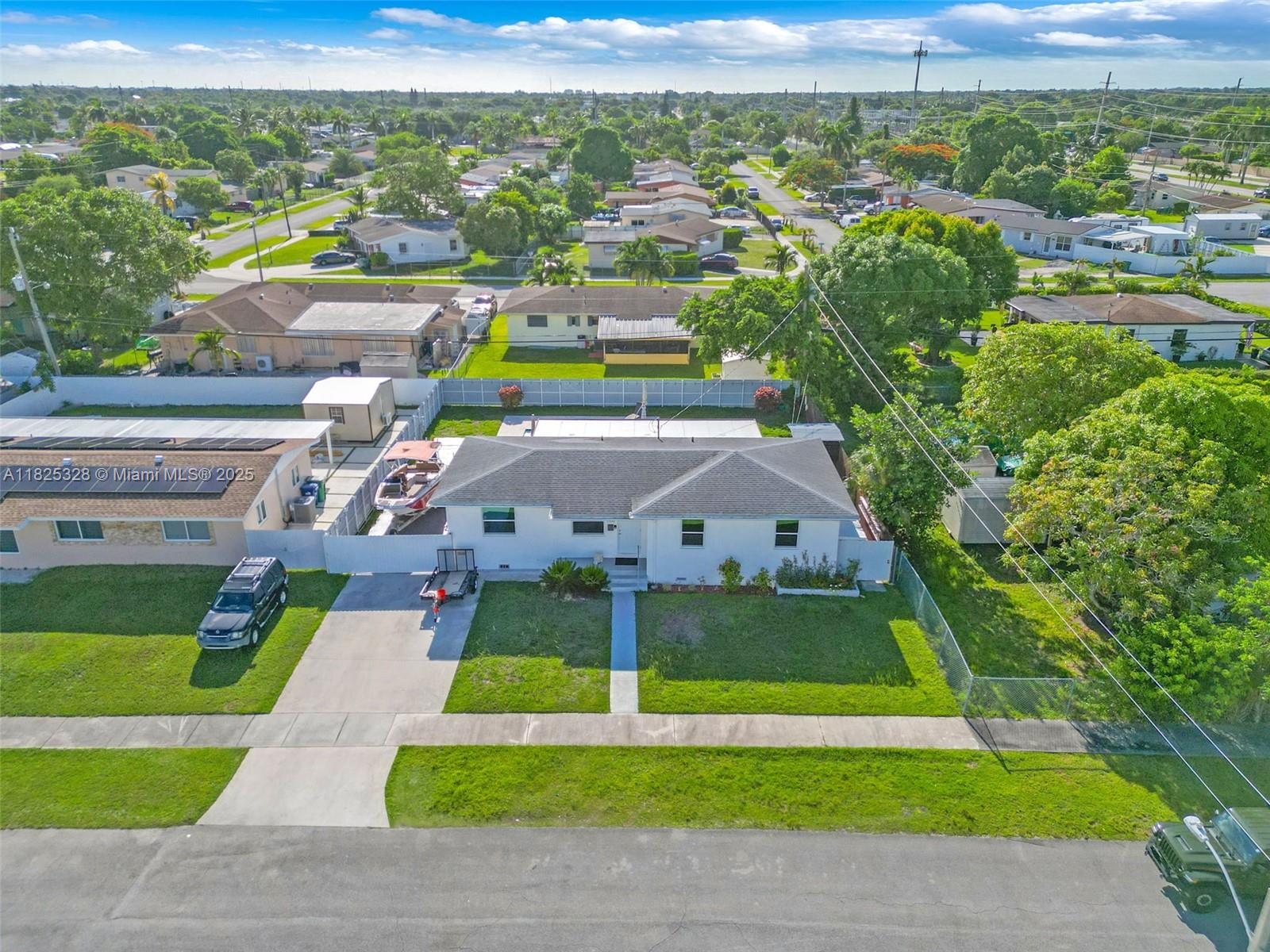 Beautiful 3-bedroom, 2-bath single-family home with no HOA! This gem features a heated pool, aluminum fencing, and a covered roof patio perfect for family gatherings and entertaining. Sitting on a spacious 7,500 sq ft lot, there's plenty of room for a boat. Enjoy peace of mind with impact windows throughout. Don’t miss this perfect blend of comfort, space, and lifestyle!