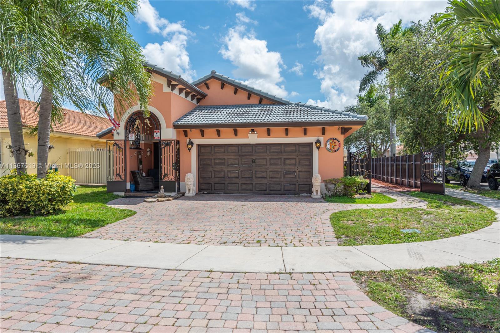 Artfully and smartly remodeled single home in the Avalon Estates area, a very quiet neighborhood of Miami Lakes with no HOA fees. This coveted corner home is sensibly priced for a quick sale. It is conveniently located near great schools, highways, and shopping centers. The home boasts vaulted ceilings, a gourmet kitchen with an open concept to the family room, adjacent to the patio with its gazebo; great for large family gatherings and entertaining, extendable to the formal dining and living rooms and glassed courtyard. The sensibly sized 3 bedrooms and 2 bathrooms can accommodate a family of 4 or 5. For more impromptu sleeping, the air-conditioned 2-car garage contains 2 Murphy beds. More car or boat parking space runs along the right-hand side of this privately fenced house