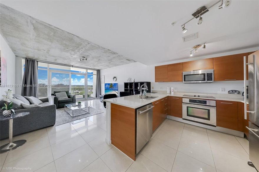 Welcome to Midblock – a vibrant, pet-friendly community in the heart of Midtown Miami! This spacious and modern 1-bedroom, 1-bath condo (Unit 811) features floor-to-ceiling windows, high ceilings, and an open floor plan with abundant natural light. Enjoy sleek finishes, stainless steel appliances, in-unit washer/dryer, and a private balcony with stunning city views. This unit comes with a rare extra storage space, ideal for bikes, luggage, or seasonal items. Midblock offers resort-style amenities including a rooftop pool, state-of-the-art fitness center, 24-hour security, concierge, and covered parking. Located steps from trendy shops, top-rated restaurants, art galleries, and just minutes to Wynwood, Design District, and Miami Beach. Perfect for end-users or investors.
